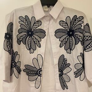 White button down blouse with navy embroidered flowers size Large